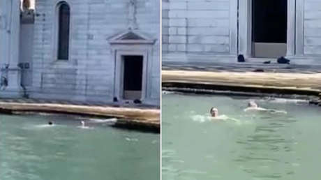 turistas-nadan-en-las-aguas-de-historico-cementerio-de-venecia